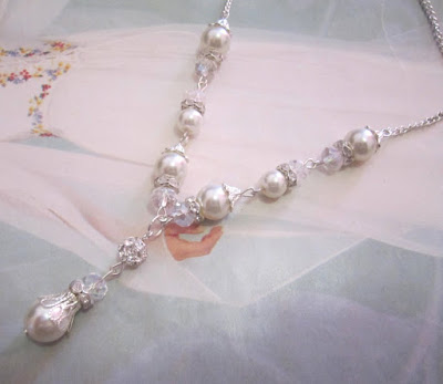 https://www.etsy.com/listing/195137546/bridal-y-style-necklace-crystal-pearl-y?ga_search_query=y&ref=shop_items_search_1