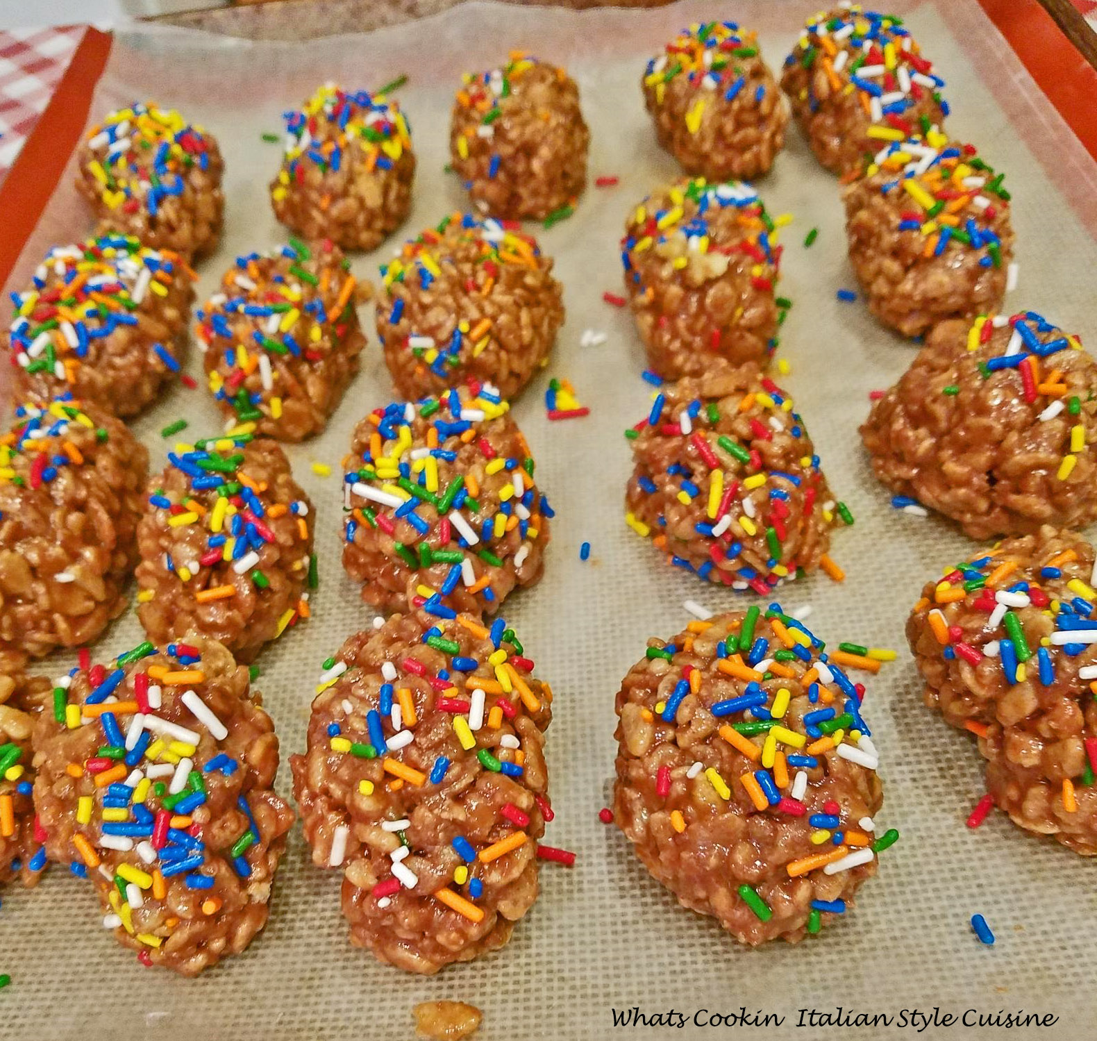 Peanut butter rice krispies and peanut butter cups all in one shaped Easter egg with sprinkles on top for a festive look. A no bake treat more like a candy than a cookie