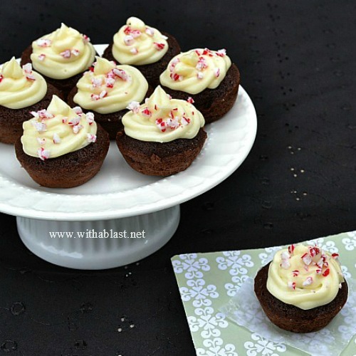 Moist mini Candy Cane Brownie Bites with a White Chocolate Cream Cheese Frosting and sprinkled with crushed Candy Cane