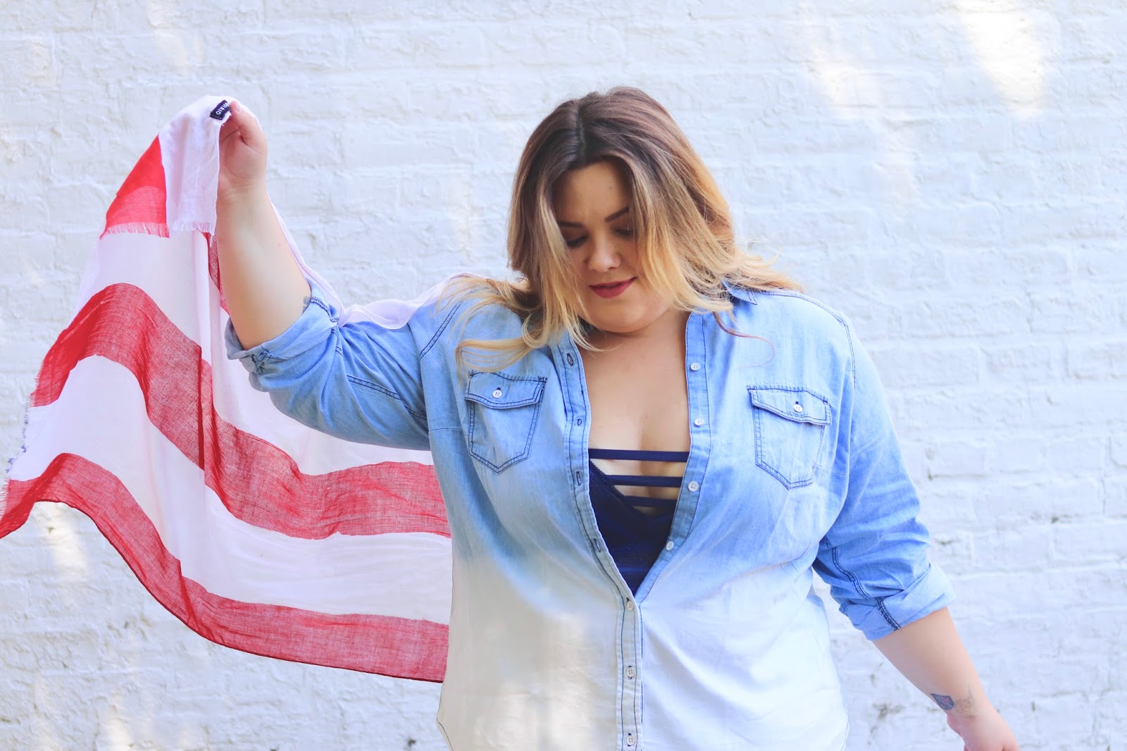 natalie craig, Natalie in the city, fourth of July outfits, 4th of July fashion, torrid, blogger review, summer fashion trends, American flag, fatshion, plus size fashion blogger, Chicago blogger, midwest blogger, curves and confidence, affordable plus size clothing, chambray, plus size white denim