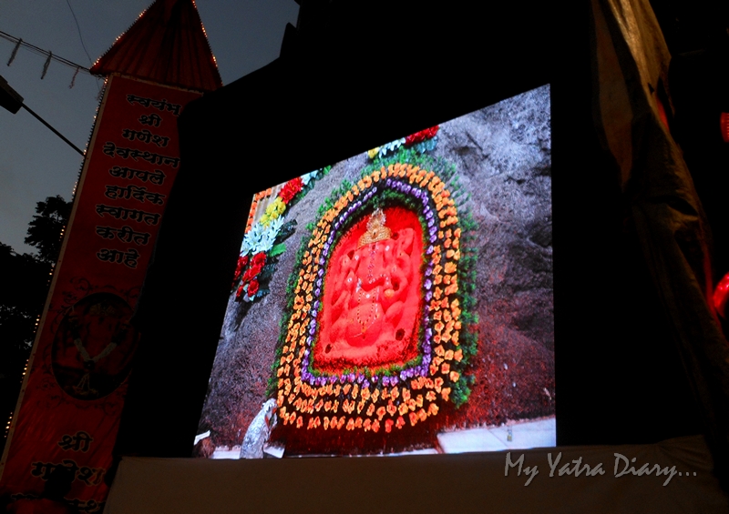 A TV display of Ganesha during the festival of Ganesh Visarjan, Mumbai