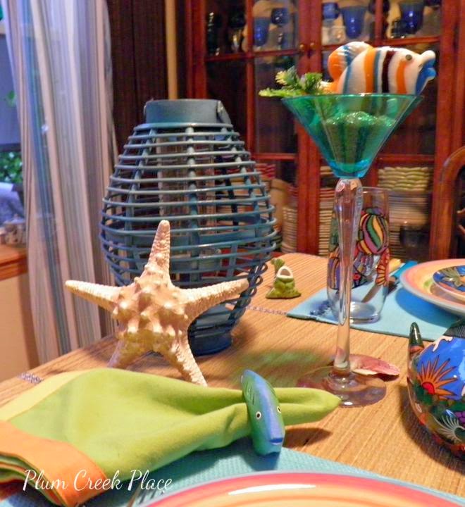 Tropical fish tablescape, Department 56 Mirage plates, tropical fish glasware.