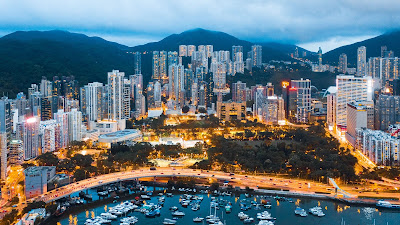 City, port, boats.  Sea, buildings, mountains