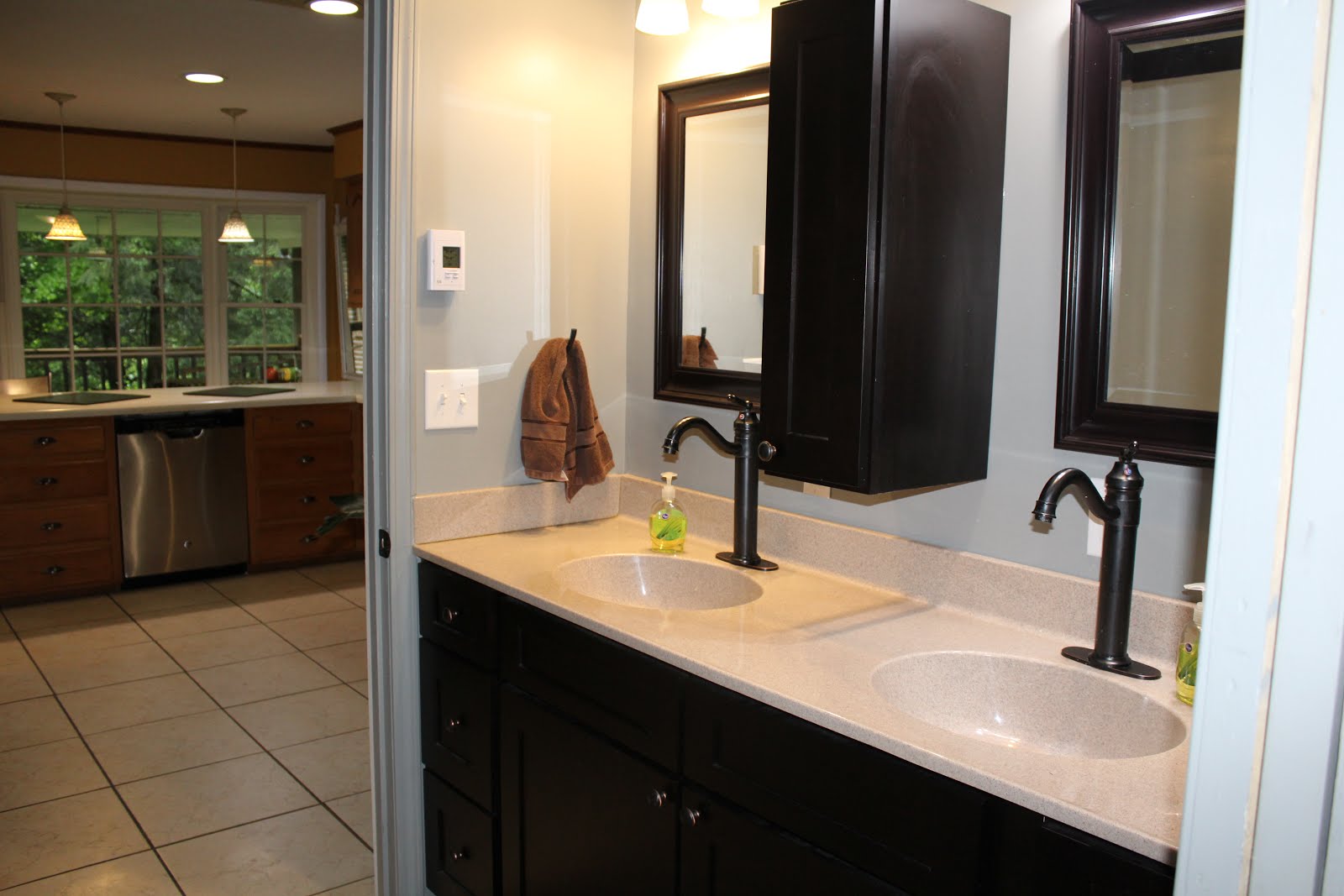 CLICK to view Full bathroom off kitchen entrance. Newly remodeled.