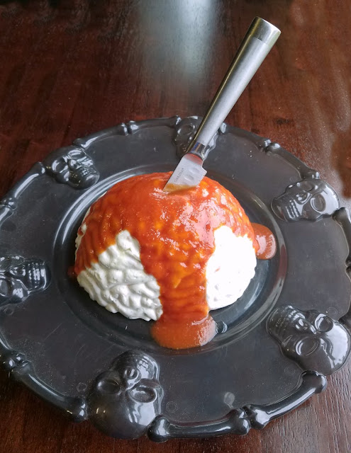 This shrimp dip is the perfect topper for crackers. Shape it like a brain with cocktail sauce blood for a creepy Halloween party snack. This shrimp dip is the perfect topper for crackers. Shape it like a brain with cocktail sauce blood for a creepy Halloween party snack.