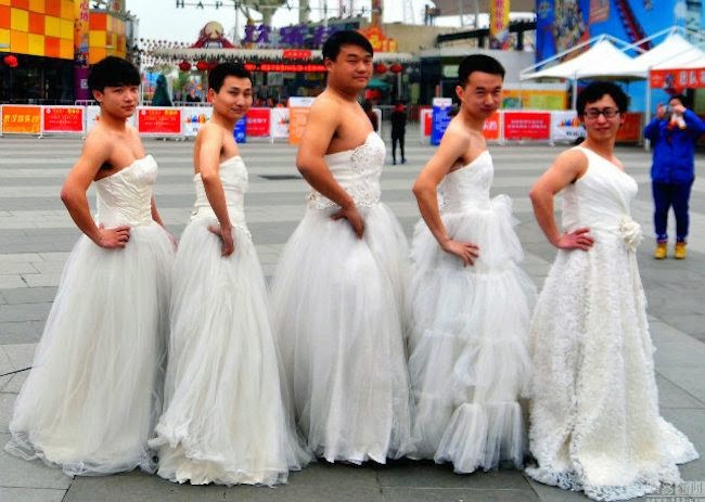 men-dressed-in-wedding-gowns