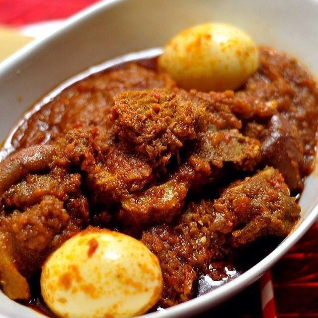 Spicy Nigerian Stew With Assorted Meat And Eggs. 