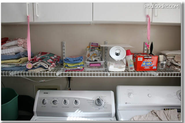 Laundry room ideas for storage and organization in a pretty and inexpensive way. #storage #organization #LaundryRoom #RealCoake