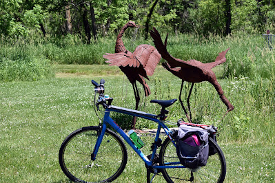 bike with birds statue
