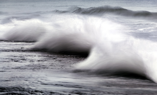 Waves crash onto Sandsend sea wall near Whitby North Yorkshire by Martyn Ferry Photography