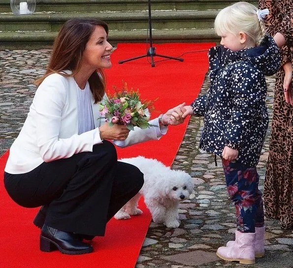 Princess Marie wore a tricotine jacket by Emporio Armani, and a new silk blouse by Hugo Boss