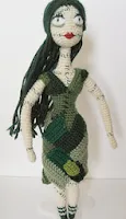 http://www.ravelry.com/patterns/library/patch-doll-amigurumi-pattern