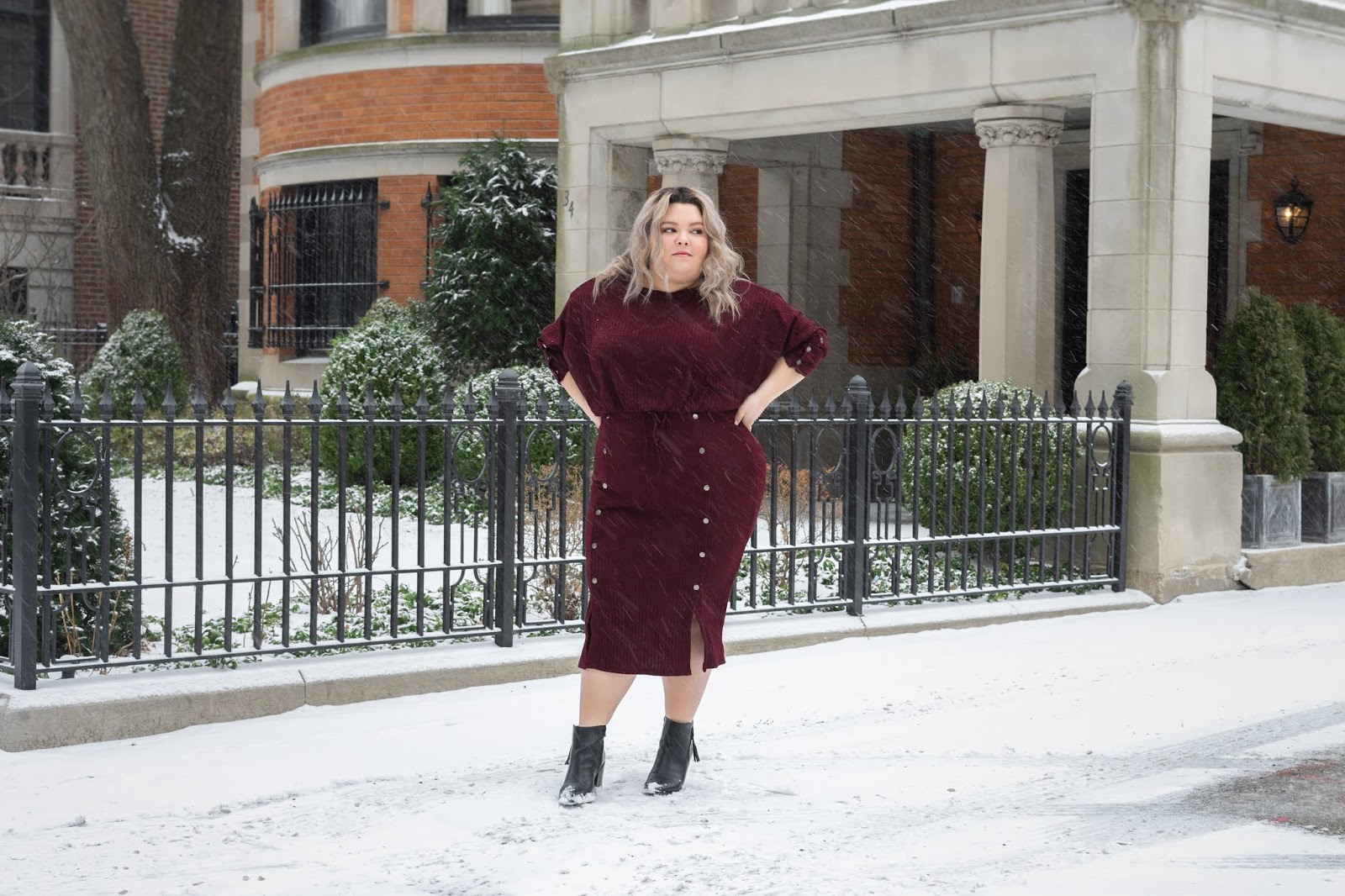 Chicago Plus Size Petite Fashion Blogger, youtuber, and model Natalie Craig, of Natalie in the City, reviews Soncy's Ruby Red Midi Skirt and Cropped Top.