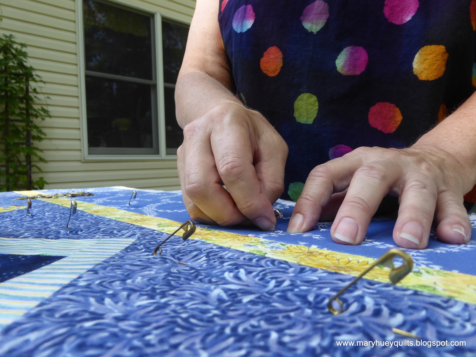 Quilting through Rosecolored Trifocals! Layering a Quilt another