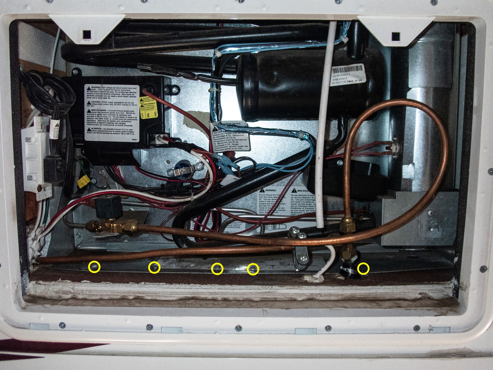 Binnshire, Backpacks, and Beer Installing a Cold Weather Kit on our Norcold Refrigerator