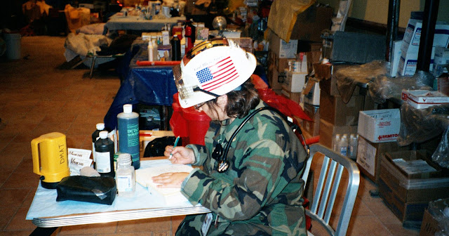 Christine Casey sits at a table