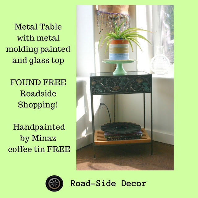 Metal table with painted metal molding & glass top.