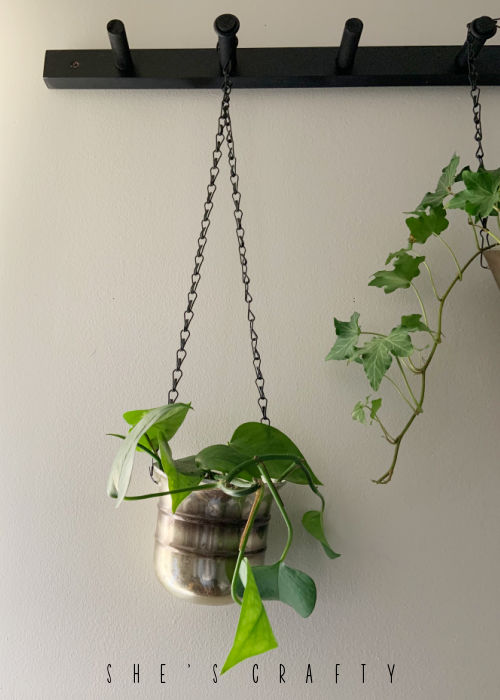 How to make a hanging plant holder from a metal piece.