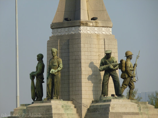 Statues representing the Air Force, Bureaucrat, Navy and Army at Victory Monument, Bangkok