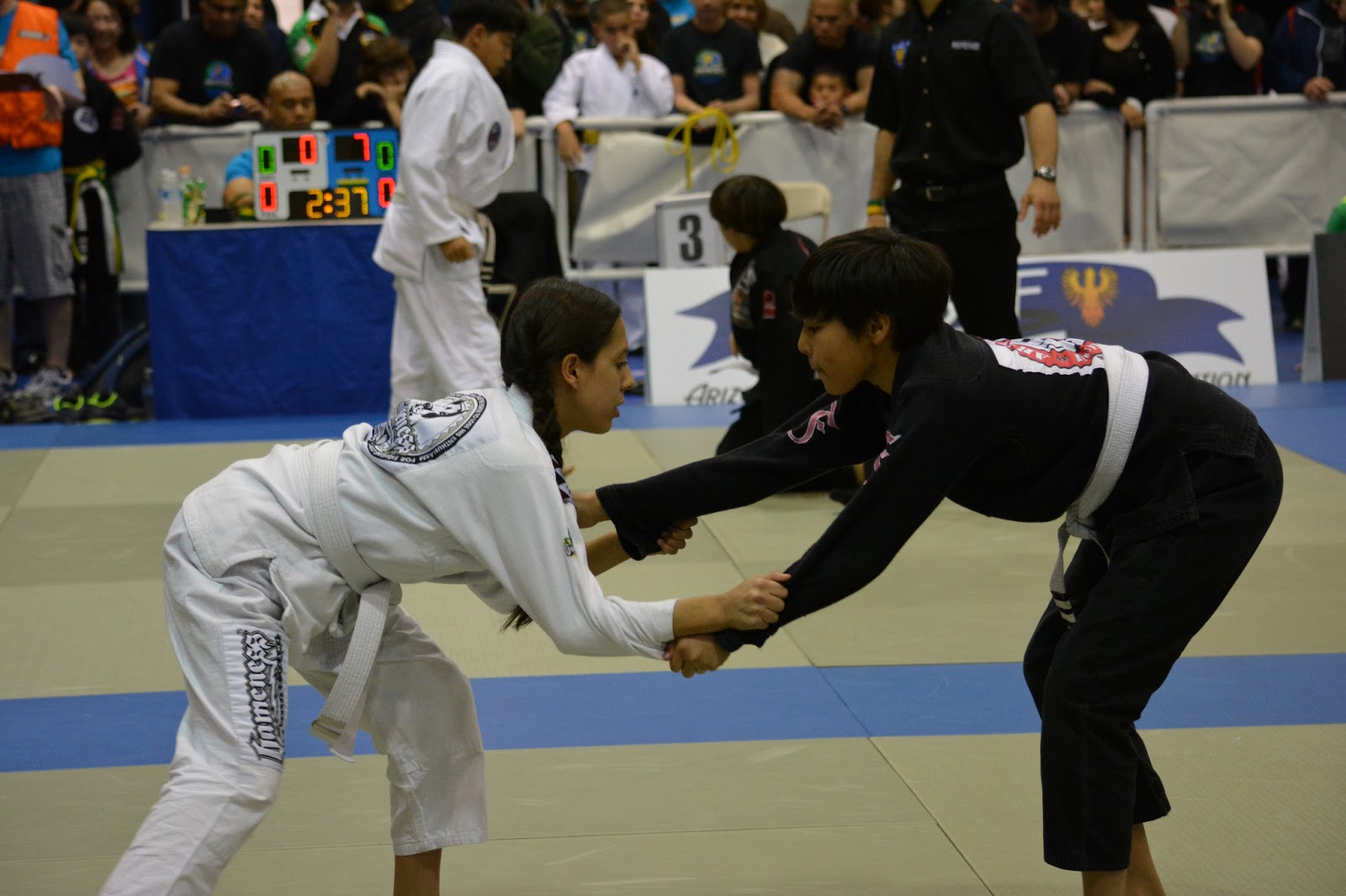 4 Stripe White Belt Pallaton Brazilian JiuJitsu students Nesa & Daniella