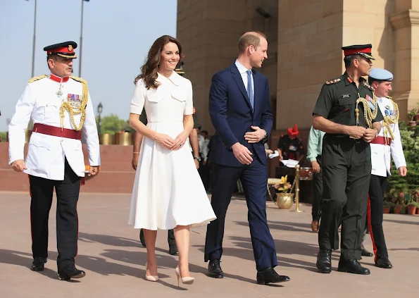 Prince William, Duke of Cambridge and Catherine, Duchess of Cambridge lay a wreath to honour the soldiers from Indian regiments who served in World War I, at India Gate