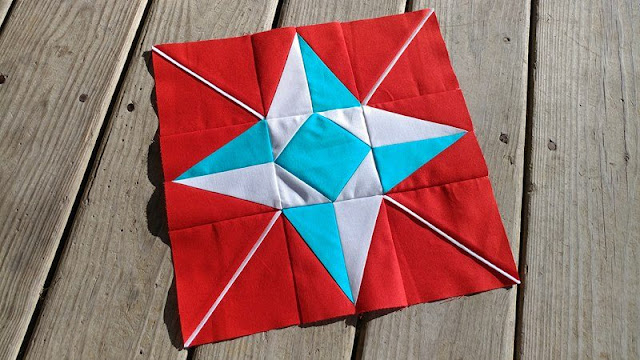 North star quilt block for the I Wish You a Merry QAL