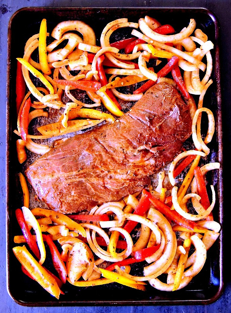 Sheet Pan Steak Fajitas are perfect for an easy weeknight meal! From www.bobbiskozykitchen.com