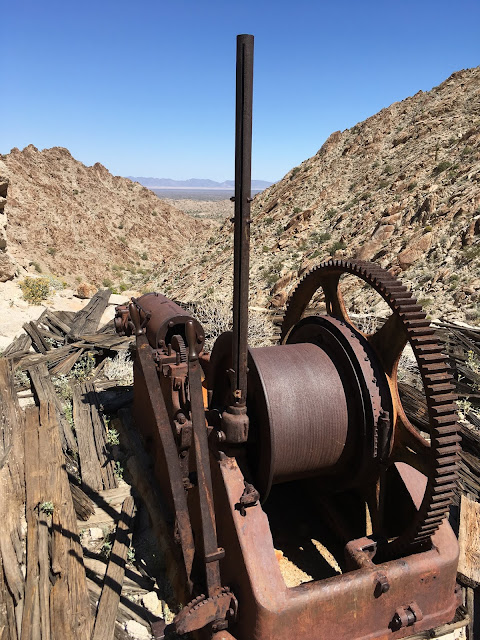 Old gasoline powered winch for main host at the Betty Lee Mine Old impulse engine and winch setup for main shaft hoist cable