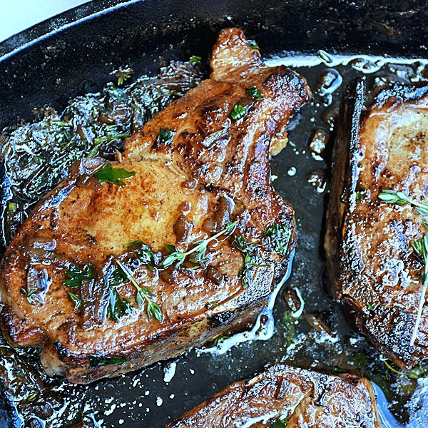 Pan-Seared Pork Chops with an Herb Butter Sauce | by Life Tastes Good