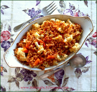 Baked Cauliflower Carrot Casserole: Cauliflower florets and baby carrots par-steamed,mixed with a few other ingredients, topped with a crunchy mixture and baked. | Recipe developed by www.BakingInATornado.com | #recipe #dinner