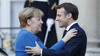 Merkelová a Macron chtějí pozvat Putina na summit EU