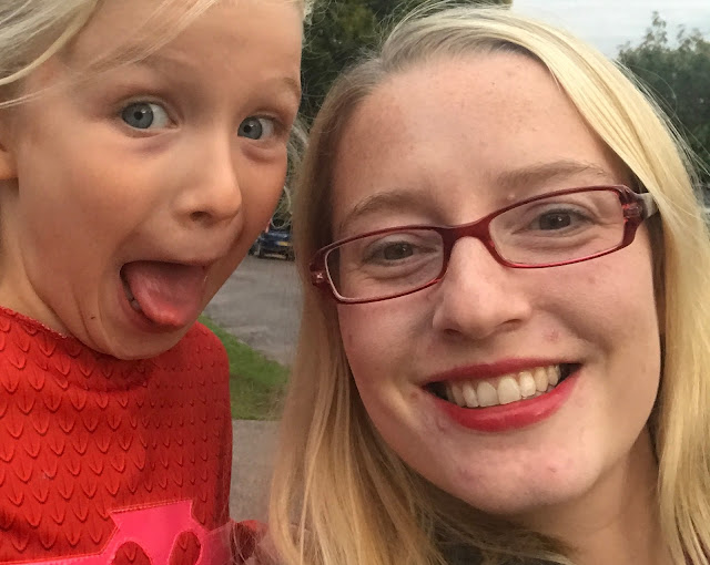 Me grinning stupidly in lovely red lip gloss and my eldest pulling a silly face