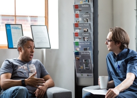 A discussion with a co-worker. A discussion with a co-worker.