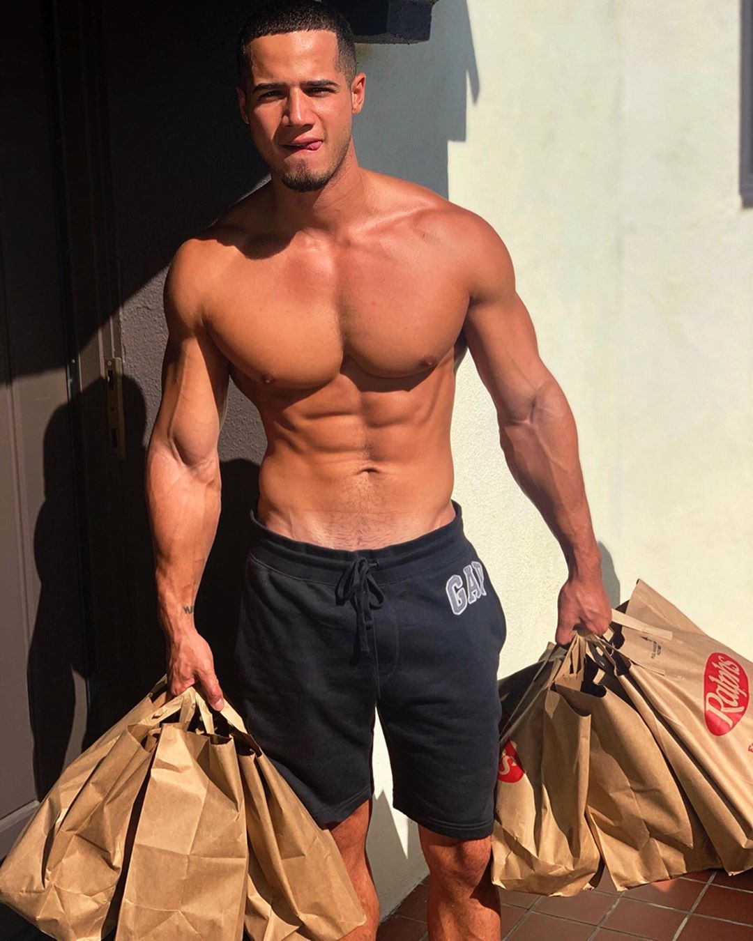 young-hot-black-mixed-dude-shirtless-muscle-pecs-hunk-tongue-out