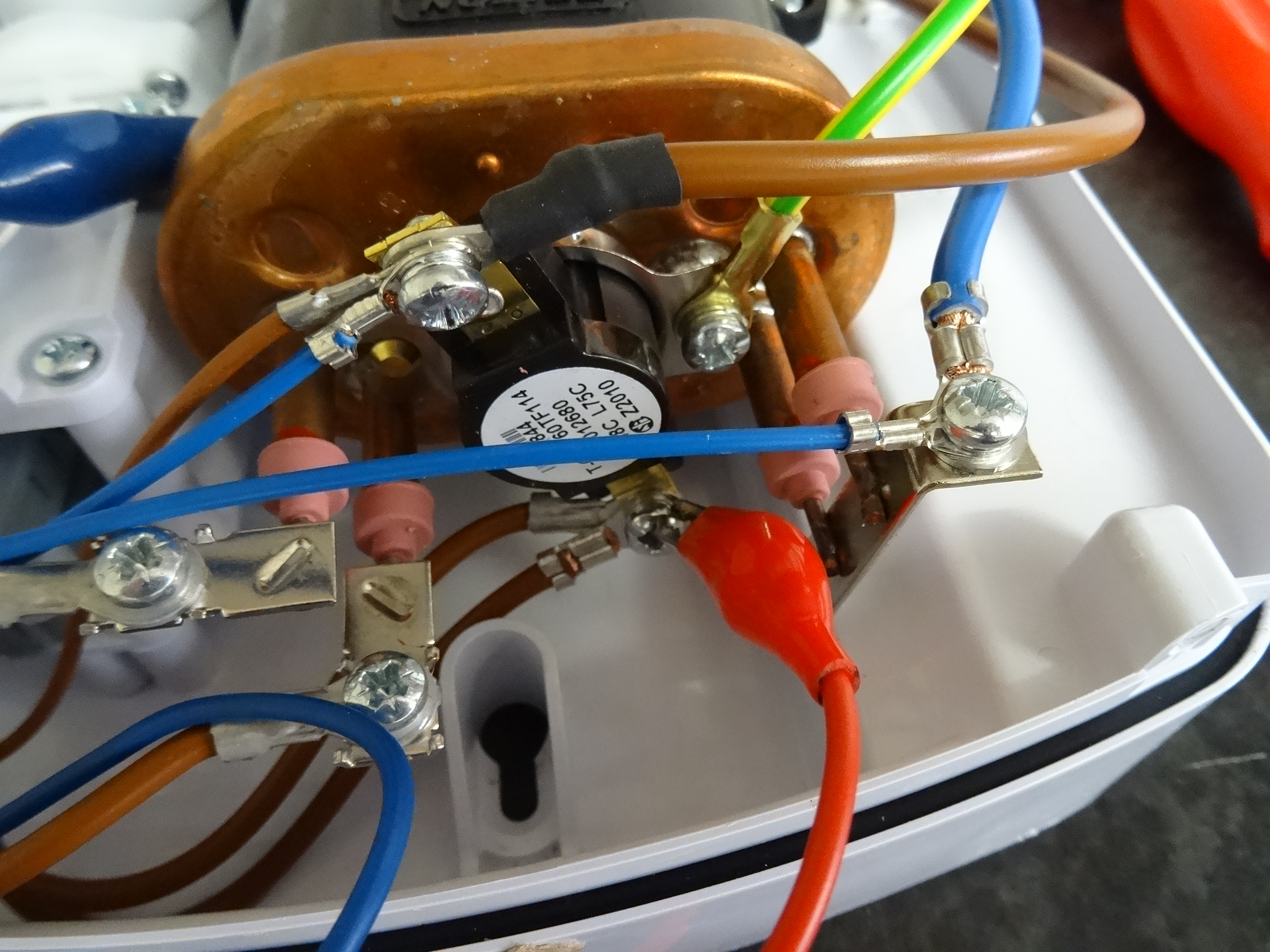 Electrical shower fault finding and repair Electric shower thermal cut out testing and