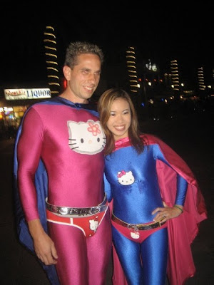 Hello Kitty superheroes - superhero costume man and woman couple