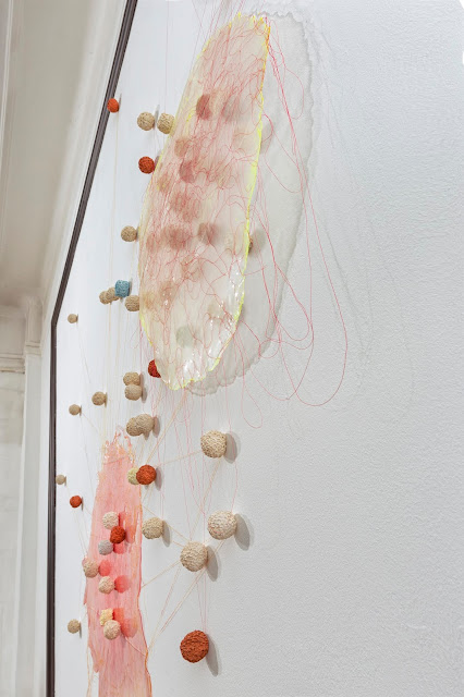 "Riso Amaro" VSC install: Approximately 47 x 59 inches. Acrylic paint skins, thread, terra cotta, porcelain, stoneware rice balls. 2019