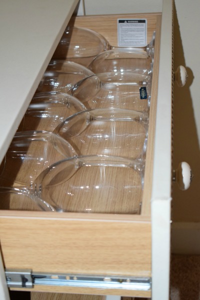 Wine Glasses displayed in an Reupholstered Chesser Drawer 
