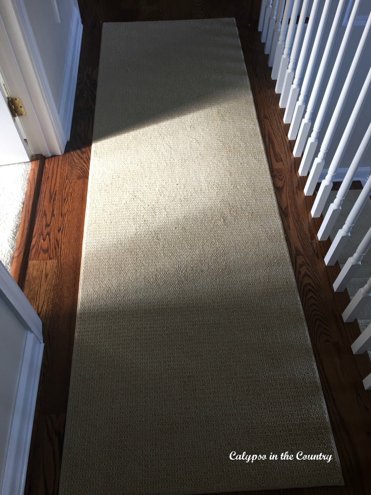 Synthetic Sisal Runner in upstairs hallway - matches stair runner