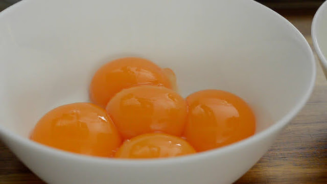 a bowl of egg yolks egg yolks
