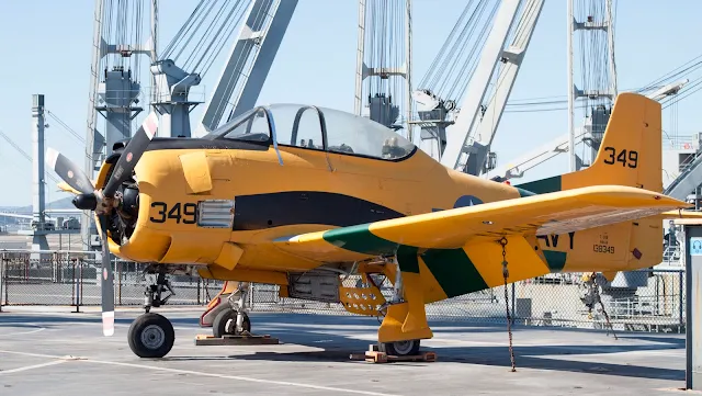 Yellow plane on the deck of the USS Hornet in Alameda, California