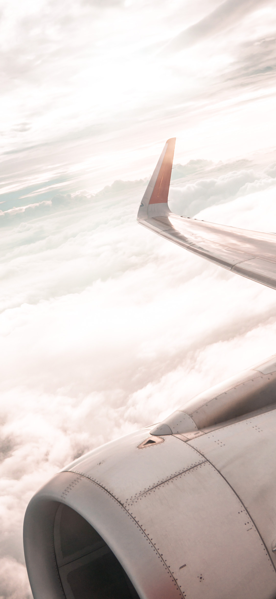 white-clouds-under-airplane-wing-wallpaper