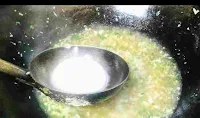 Adding slurry in lemon coriander soup