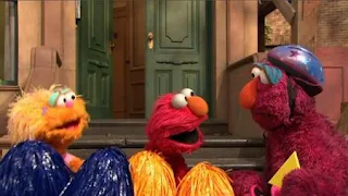 Cheerleader Elmo and cheerleader Zoe cheer for Telly. Sesame Street Episode 4420, Three Cheers for Us, Season 44