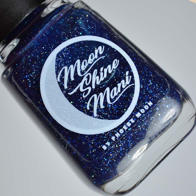 blue nail polish with holographic flecks
