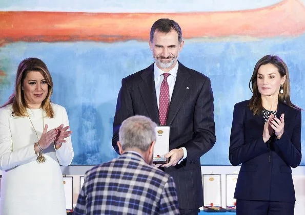 Queen Letizia wore Carolina Herrera blouse and Hugo Boss suit