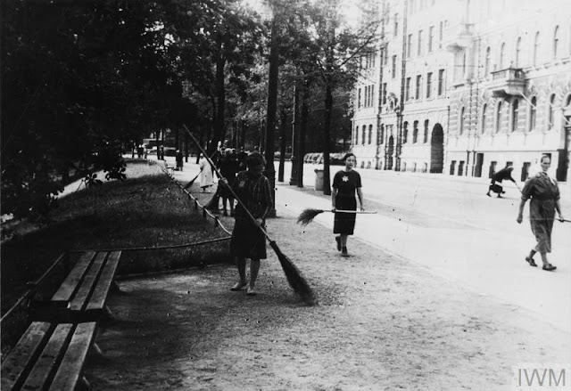 Sweeping streets in Riga, 22 August 1941 worldwartwo.filminspector.com