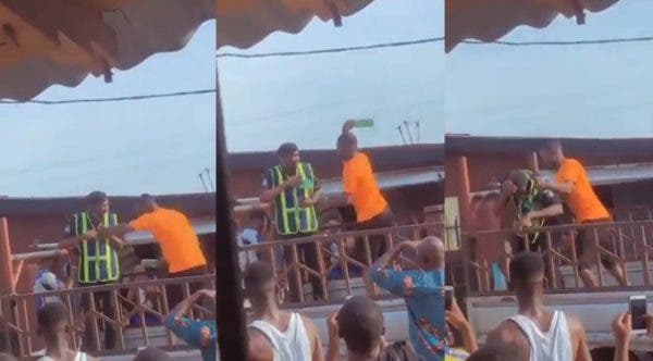 Watch the Moment a Man breaks bottle on police officer’s head in Lagos (Video)
