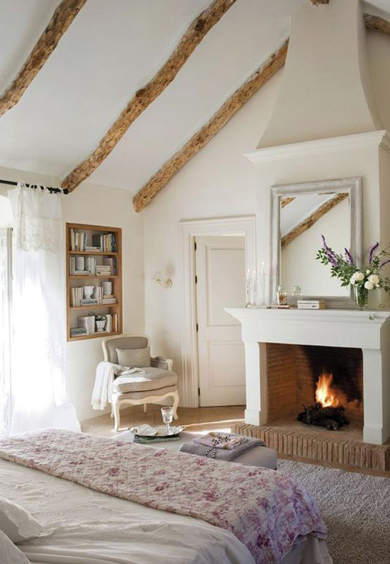 Country romantic bedroom with fireplace