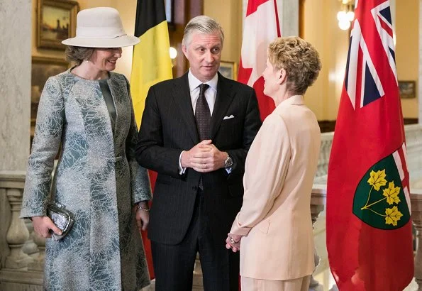 Queen Mathilde wore a gray embroidered coat by Esmeralda Ammoun, a Belgian designer